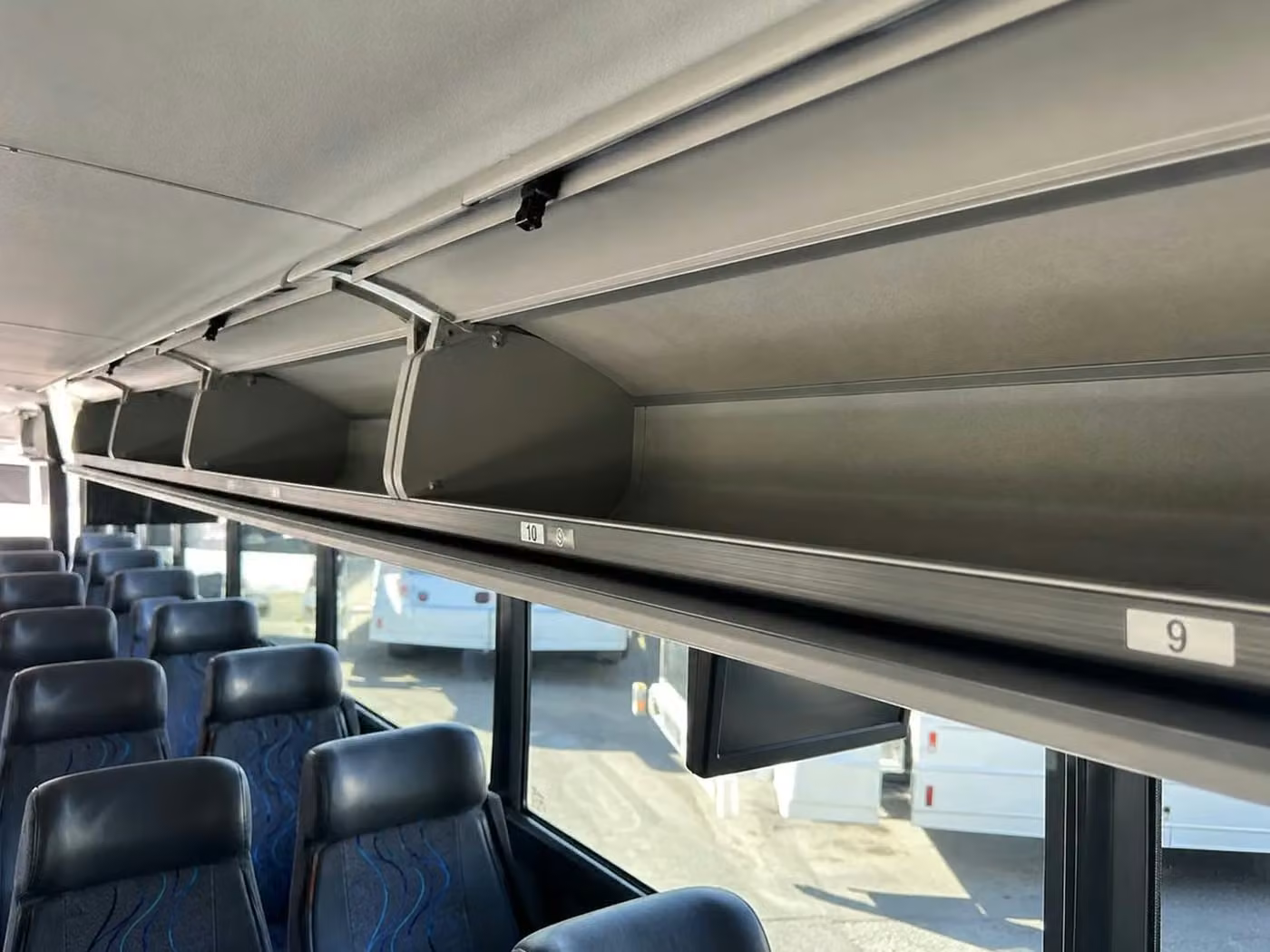 kenosha 25 passenger minibus overhead storage