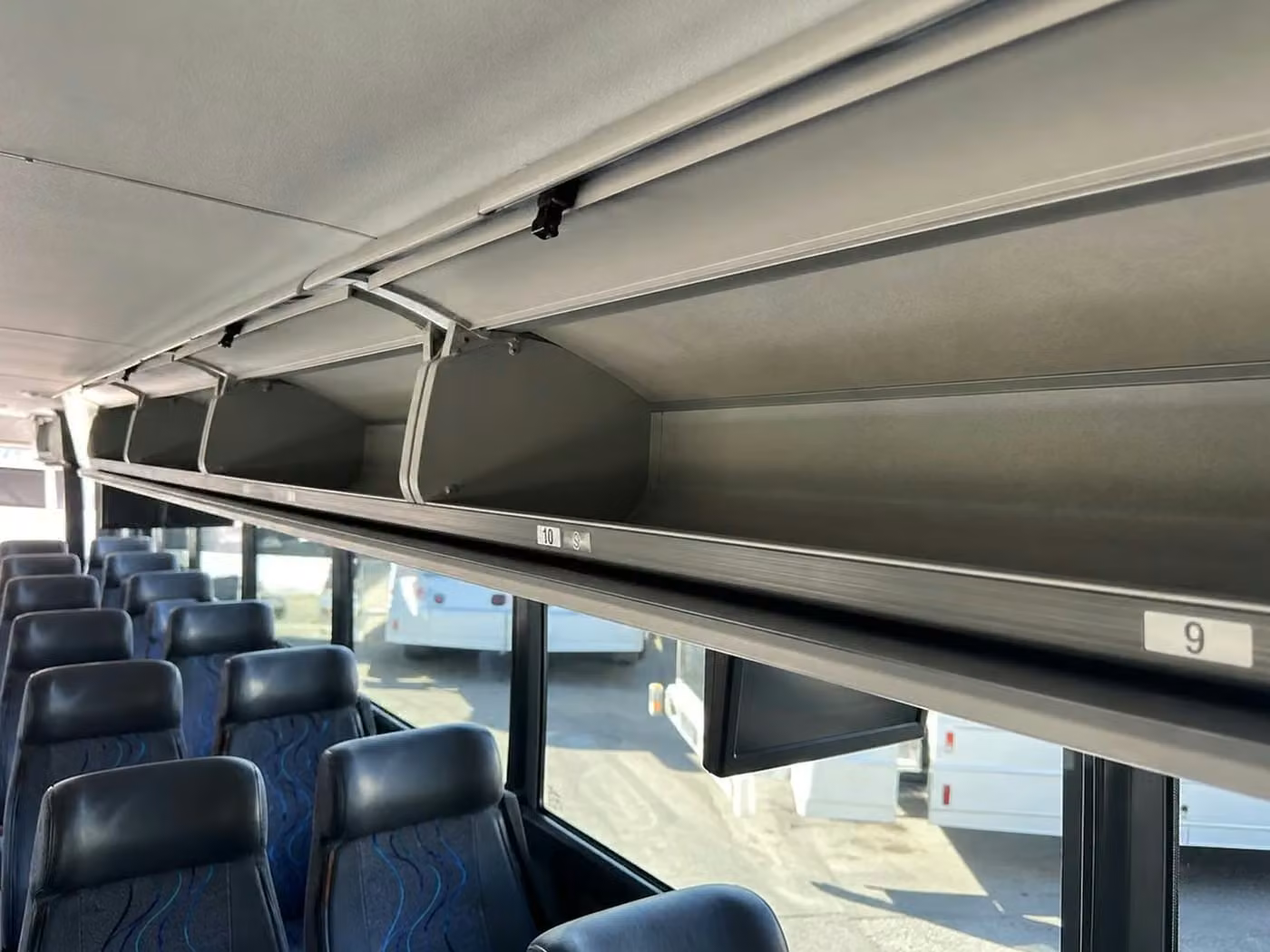 kenosha 28 passenger minibus overhead storage