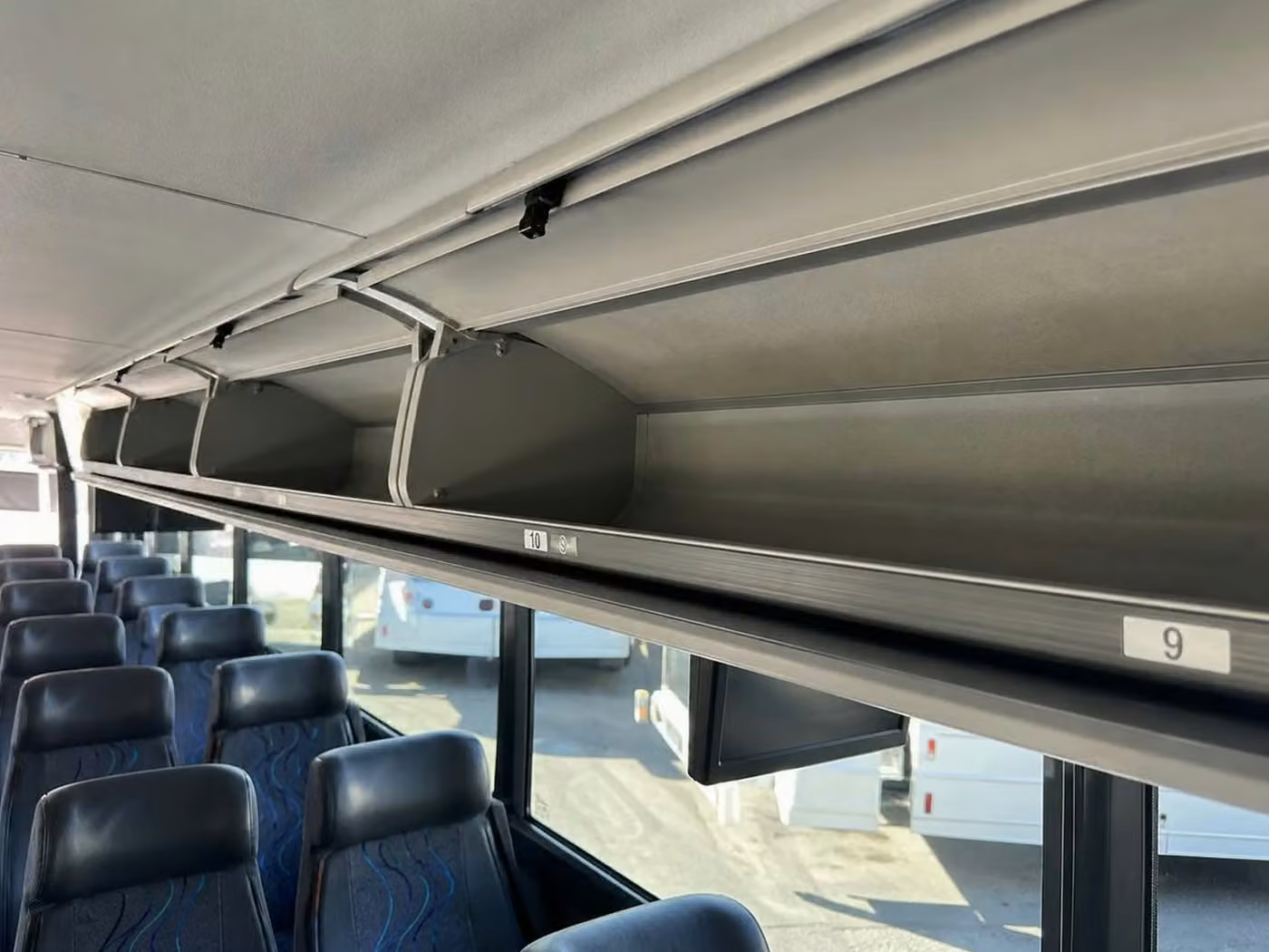 kenosha 56 passenger charter bus overhead storage